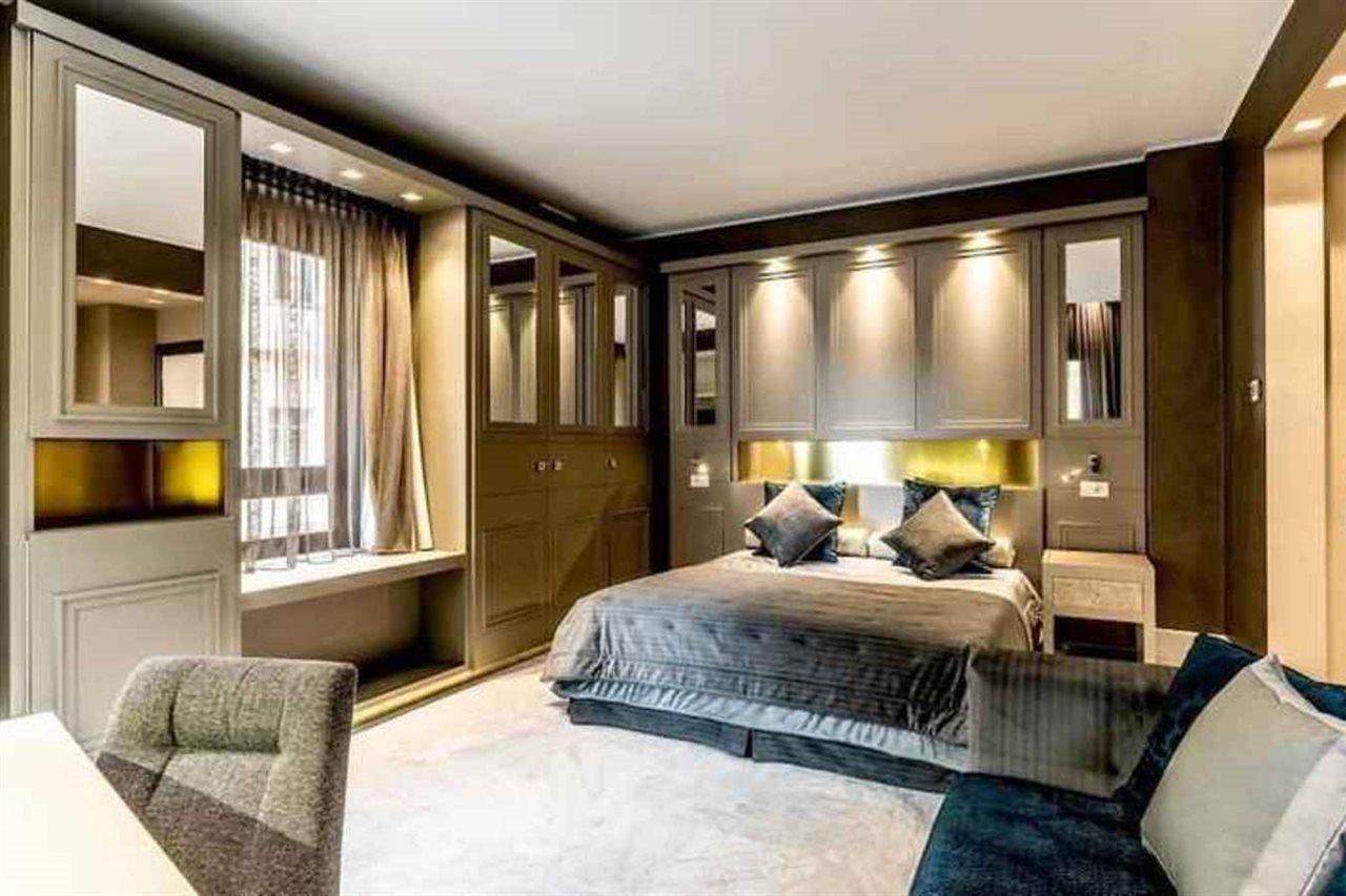 Palazzo Doglio Hotel Каляри Екстериор снимка A bedroom