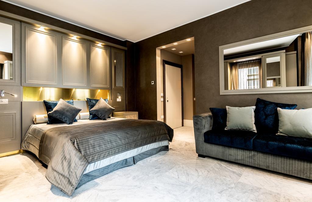 Palazzo Doglio Hotel Каляри Екстериор снимка A bedroom